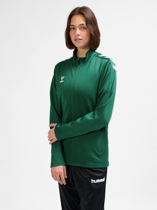 hmlCORE XK POLY ZIP SWEAT WOMAN, EVERGREEN, model